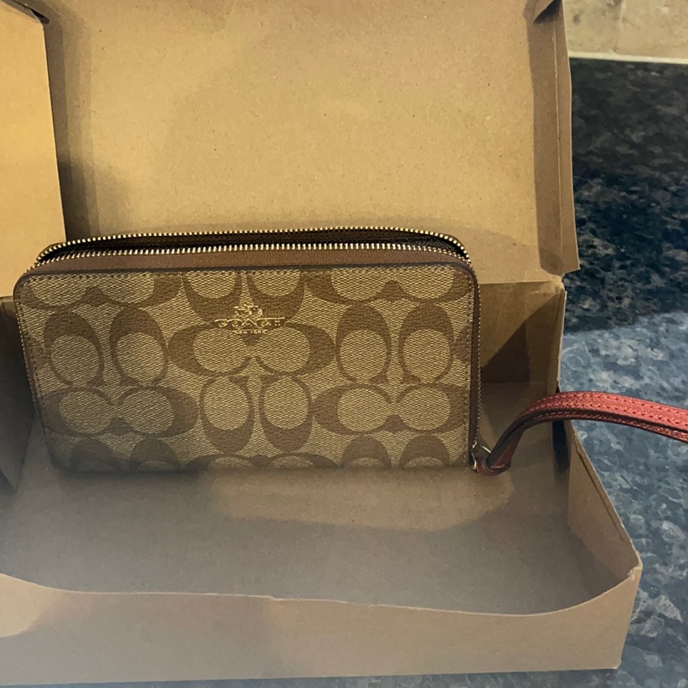 Coach signature brown wristlet/wallet
